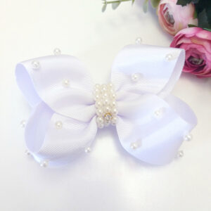 laço de cabelo para batizado